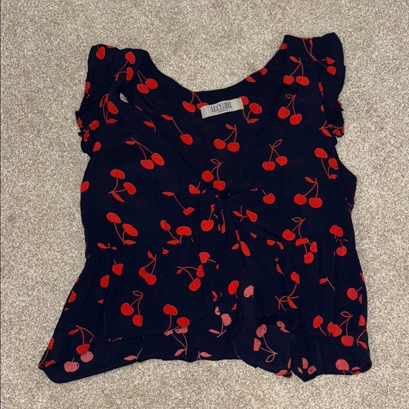 Cherry Bomb Cherry Print Tie-Front Top
Lucy Love size medium - Picture 5 of 7